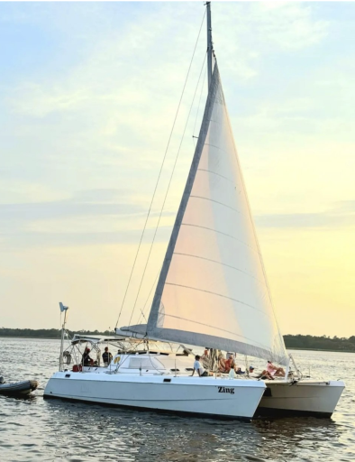 A sailboat sailing off the coast of the Hammock Coast