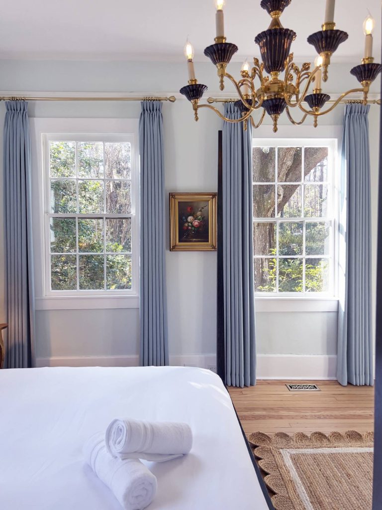Suite Six Floor Length Curtains and Chandelier