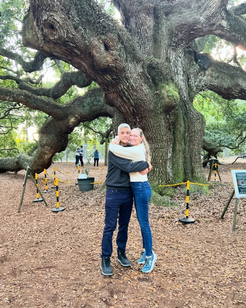 Wicklow Hall Owners David and Judith Puckett posing in front of a live oak tree